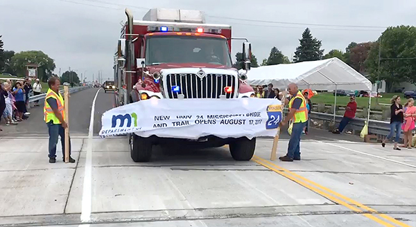 Firetruck crosses new Hwy 24 bridge.